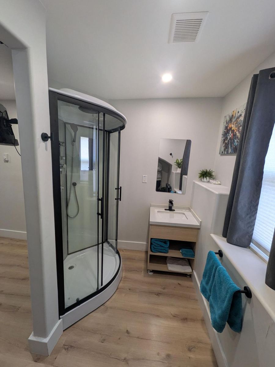 Private bathroom with glass shower